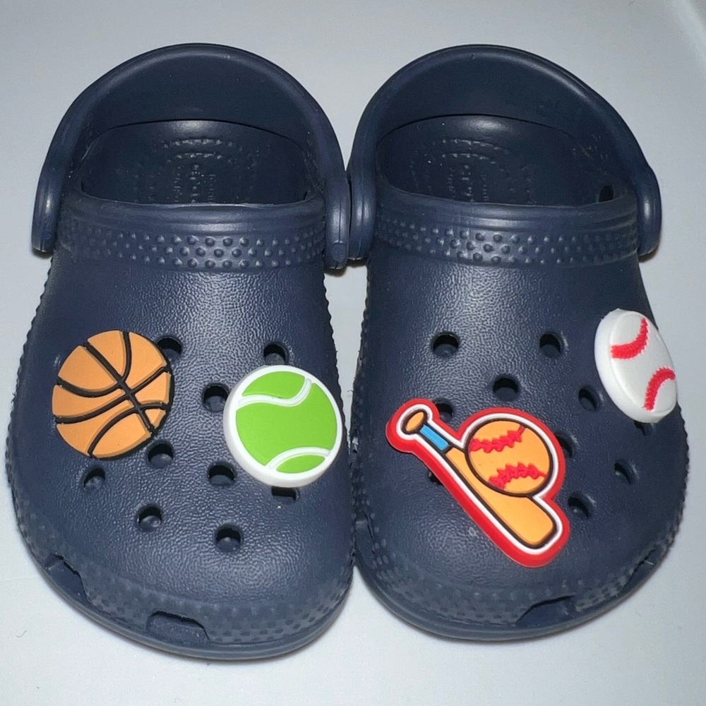 NWOT Toddler Crocs size 6C in Navy w/ sports themed Jibbets